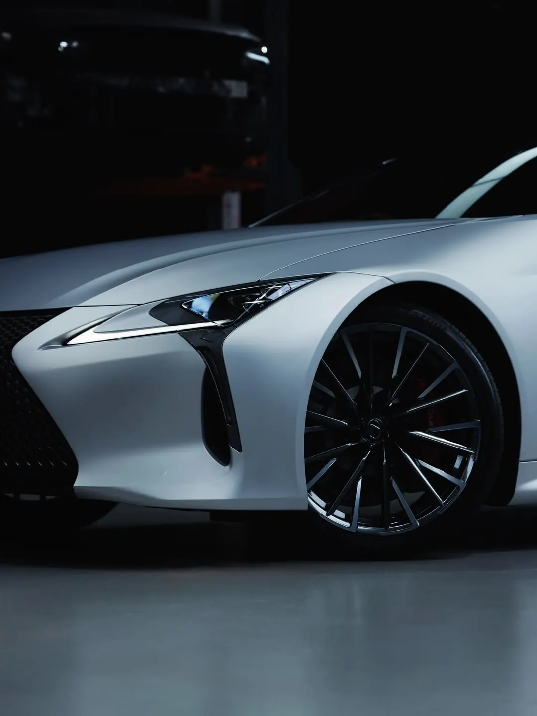 Front quarter and wheel of the satin silver Lexus LC500