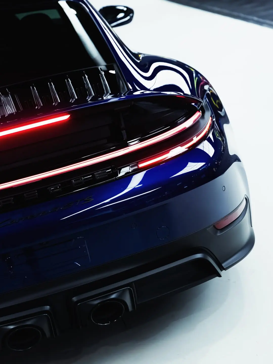 Porsche 911 Carrera 4 GTS, the rear quarter and tail light.