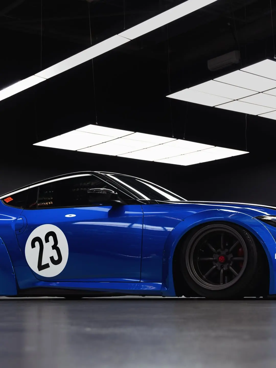 Nissan Z Liberty Walk, the side profile in the showroom.