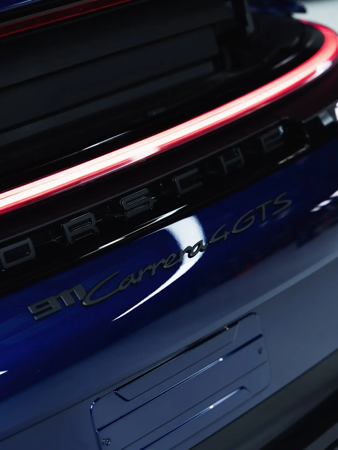 Porsche 911 Carrera 4 GTS, the model badge on the rear.