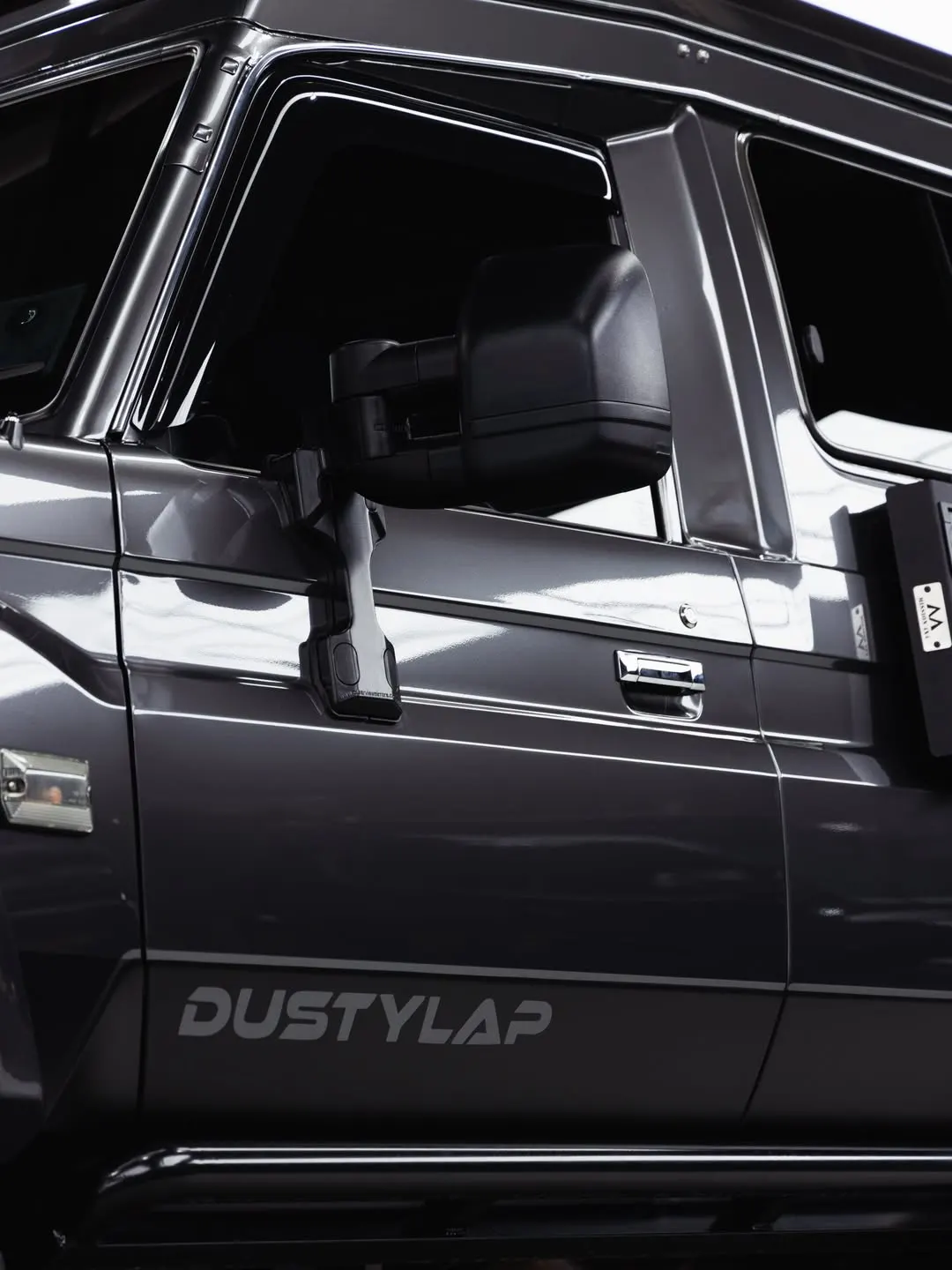 Satin black decal along the door of the Toyota Troopy