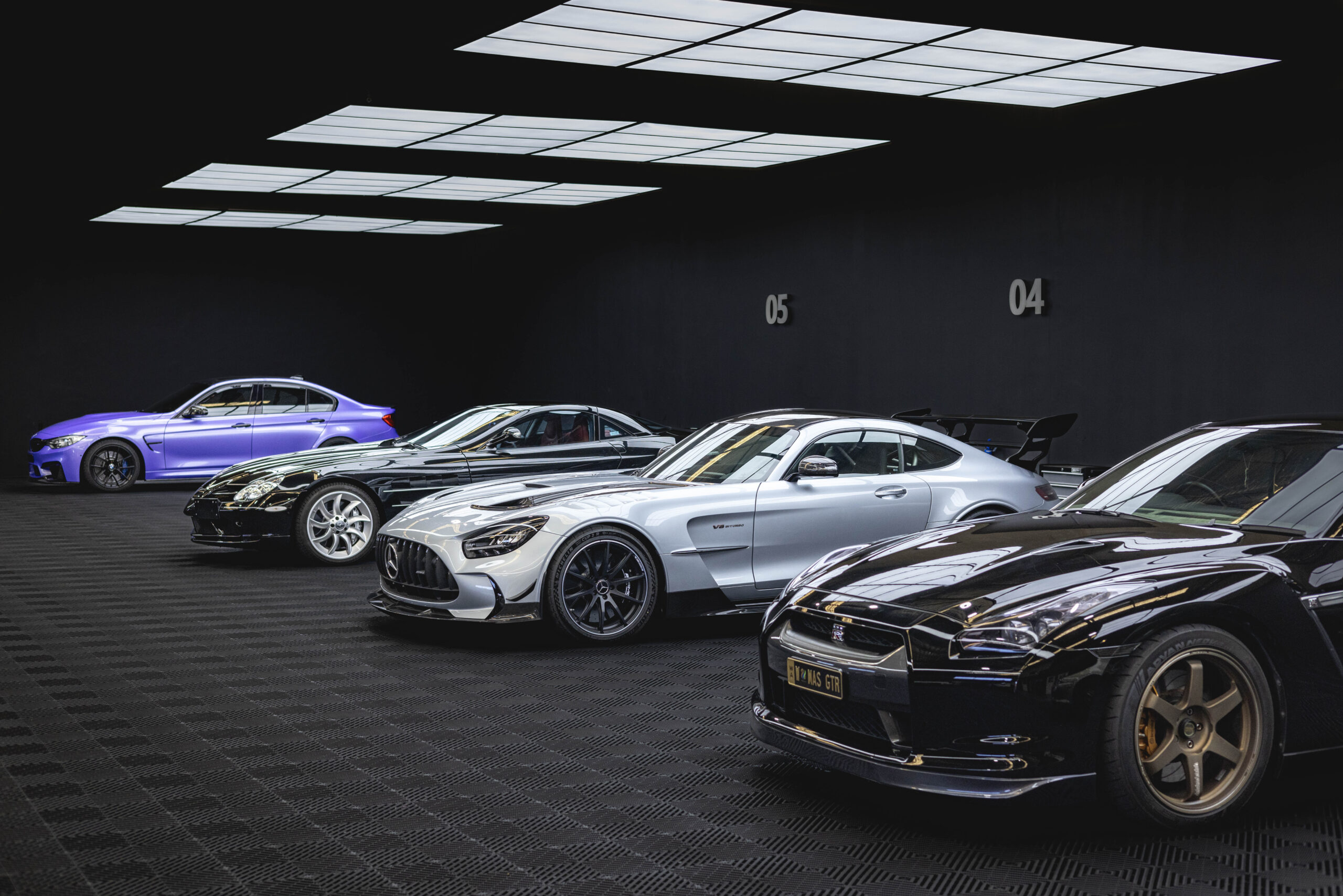 MAS Project showroom with a lineup of protected high-performance cars
